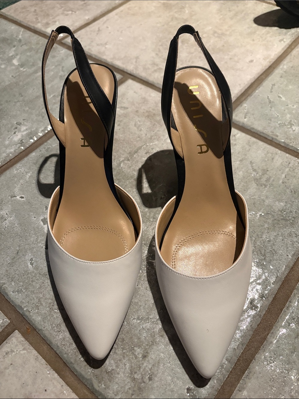 Unisa Two-Tone Pointed Slingback Flats in White and Black